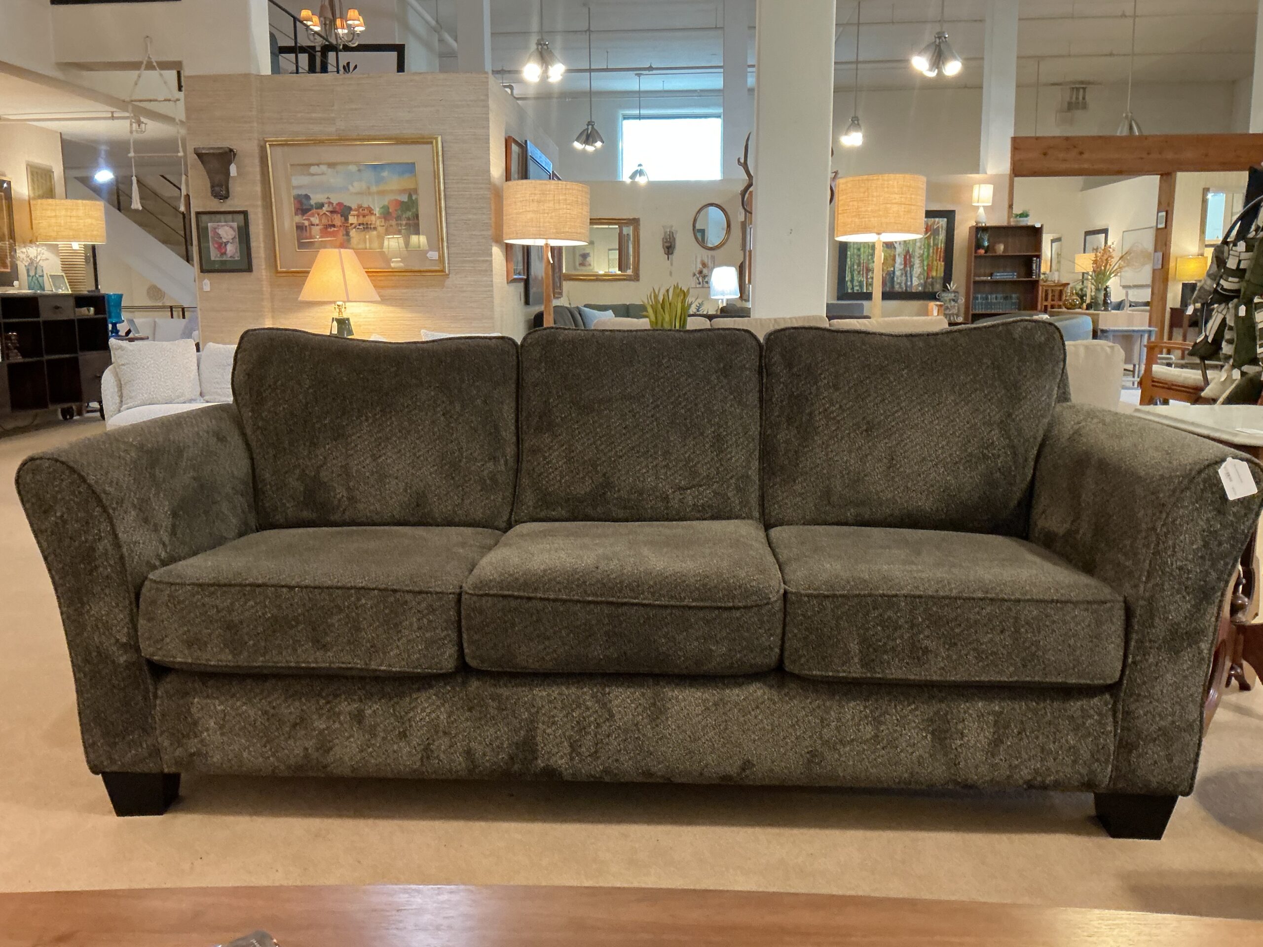 grey upholstered sofa